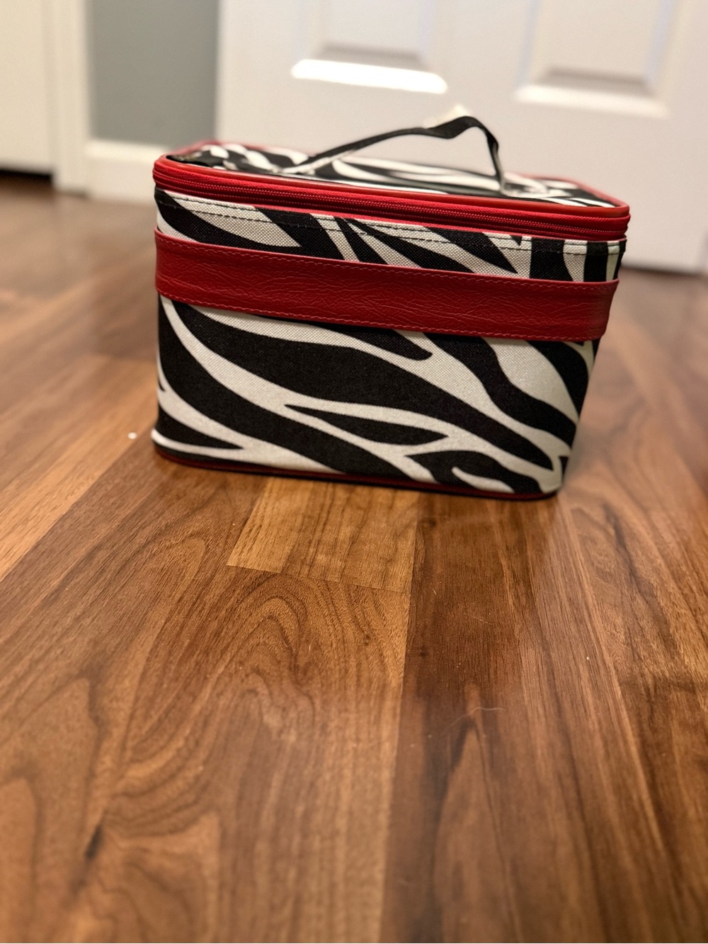 Zebra Print Cosmetic Train Case with Red Trim